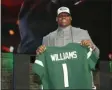  ?? THE ASSOCIATED PRESS ?? In this file photo, Quinnen Williams poses with his new team jersey after the New York Jets selected Williams in the first round at the NFL football draft in Nashville, Tenn.