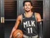  ??  ?? Hawks guard Trae Young models the City Edition uniform honoring Martin Luther King Jr.