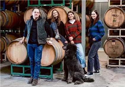  ?? ?? Winemaker Alex Pomerantz, left, with colleagues Anne Disabato, Natalia Kaminski and Dominique Henderson (and Lou, the dog).