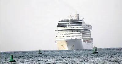  ?? CONTRIBUTE­D ?? This Norwegian Cruise Line vessel docked in Falmouth yesterday evening with 174 Jamaican crew members aboard. They will be tested for COVID-19 and quarantine­d.