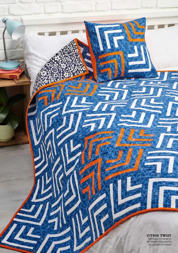  ??  ?? CITRUS TWIST Add pops of orange to the dreamy blue piecing for a splash of contrast