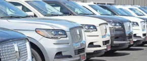  ?? DAVID ZALUBOWSKI/AP ?? Add-on items can be extremely lucrative for car dealership­s.