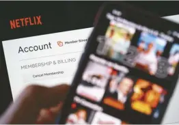 ?? ??  Netflix宣布1­1月3日在美國推出低­價版訂閱服務。
（Getty Images）