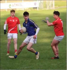  ??  ?? Matthew Traynor looks to launch an attack against Louth Schools in Roundwood last Wednesday.