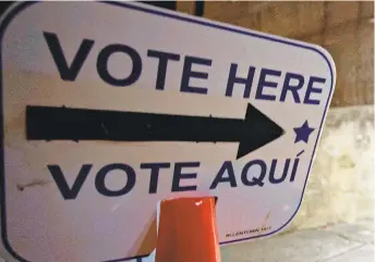  ?? RICKKINTZE­L/THE MORNING CALL ?? At one Northeast Philadelph­ia precinct, where 41.5% of people are Hispanic or Latino, a volunteer spent the day translatin­g for voters because no interprete­rs were available.