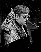  ?? PETER FOLEY/EPA ?? Elton John performs Wednesday in New York at his announceme­nt that he will retire from touring.