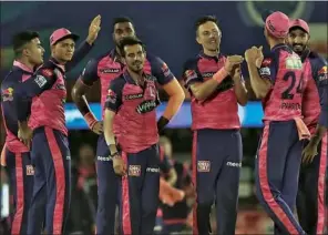  ?? (BCCI/IPL) ?? Rajasthan Royals players celebrate one of Trent Boult’s (3rd right) scalp against Lucknow Super Giants in their Indian Premier League clash at the Brabourne Stadium in Mumbai on Sunday.