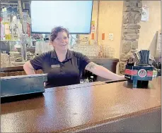  ?? Lynn Atkins/Special to The Weekly Vista ?? Tara Witten, bartender at the Highlands Pub and Patio, knows many of her customers by name and by drink.