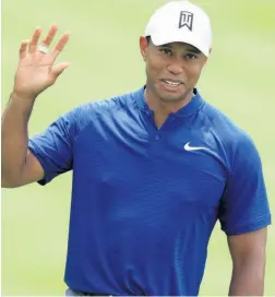  ??  ?? WOODS YOU BELIEVE IT Tiger’s 66 is his lowest PGA opener in three years