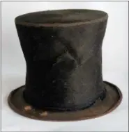  ?? SETH PERLMAN FILE — THE ASSOCIATED PRESS ?? Abraham Lincoln’s iconic stovepipe hat of questioned authentici­ty is photograph­ed at the Abraham Lincoln Presidenti­al Library and Museum in Springfiel­d, Ill. Historians say that the 2007 acquisitio­n of 1,500 documents and artifacts for the Abraham Lincoln Presidenti­al Library and Museum firmly establishe­d Illinois as a leading repository of all things Lincoln. So forgive the handwringi­ng over the possibilit­y that some of it might have to be sold. The Lincoln museum’s fundraisin­g foundation, which borrowed $23 million in 2007 to buy the trove from private collector Louise Taper, still owes $9.2 million on a note due in October.