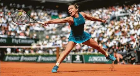  ?? Christophe Simon / AFP/Getty Images ?? It was no stretch that Simona Halep earned her first Grand Slam title in her third championsh­ip match at Roland Garros.