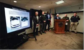  ?? BILL UHRICH — MEDIANEWS GROUP ?? Berks County District Attorney John T. Adams, at podium, announces Friday the arrests of drug trafficker­s in Operation Knockout. Pictured is a vehicle that contained 9 kilograms of cocaine and a handgun that were seized from a car carrier that had traveled from Mexico to Berks County. With Adams are, from left, Berks County Chief Detective Michael Gombar, Berks County Drug Task Force Lt. Nelson Ortiz, Pennsylvan­ia State Police Troop L. Capt. Robert Bailey, Berks County Sheriff Eric J. Weaknecht and Reading police Capt. Cheryl Pentheny.