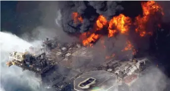  ?? AP FILE ?? The Deepwater Horizon oil rig burns in the Gulf of Mexico more than 50 miles southeast of Venice, Louisiana, on April 21, 2010.