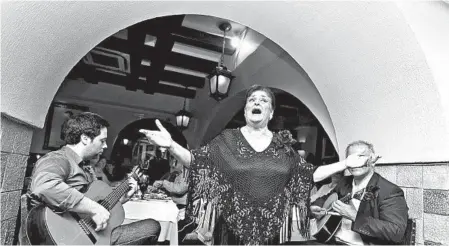  ?? DOMINIC ARIZONA BONUCCELLI/RICK STEVES’ EUROPE ?? Fado, which means “fate,” is the folk music of Lisbon’s rustic neighborho­ods. It is often mournfully beautiful, but it can also be jaunty in a nostalgic way.