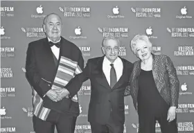  ?? GARETH CATTERMOLE/GETTY IMAGES ?? Osage Nation Chief Geoffrey Standing Bear and filmmakers Martin Scorsese and Thelma Schoonmake­r attend the “Killers Of The Flower Moon” Headline Gala premiere Oct. 7 during the 67th BFI London Film Festival at The Royal Festival Hall in London, England.