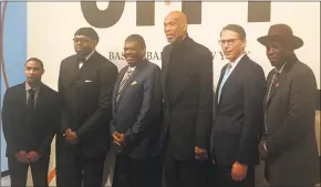  ?? Doug Feinberg / Associated Press ?? New York basketball stars, from left, Andre Barrett, Sam Perkins, Bernard King, Kareem Abdul-Jabbar, Kiki VanDeWeghe and Felipe Lopez celebrate the opening of an exhibit to honor the history of the game in the Big Apple.