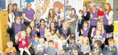  ??  ?? Pictured are Radmoor Day Nursery and holiday club staff members celebratin­g with youngsters.