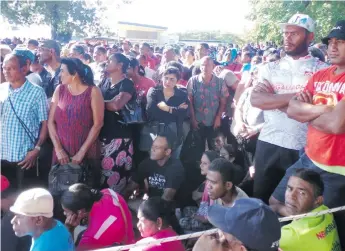  ??  ?? Hopeful Fijians waiting patiently to get their Home Care Initiative Assistance at Shirley Park, Lautoka, yesterday.