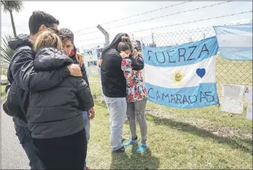  ??  ?? Relatives of crew member Luis Tagliapiet­ra express their grief outside Argentina’s Navy base in Mar del Plata, on the Atlantic coast south of Buenos Aires. — AFP photo