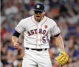  ?? Steve Gonzales / Staff photograph­er ?? Closer Roberto Osuna caps off the Astros’ victory in style by striking out Javier Baez after making it interestin­g by allowing two homers in the ninth.