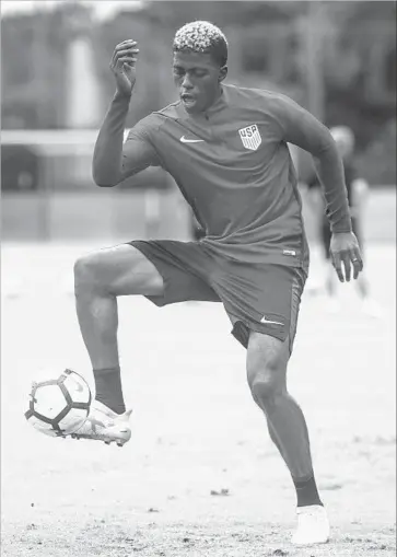  ?? Josie Norris Associated Press ?? FORWARD GYASI ZARDES, who had been mired in a prolonged slump with the Galaxy, set up two scoring chances and assisted on the game-clinching goal in Team USA’s Gold Cup victory against Martinique.