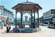  ?? - PTI ?? DESERTED: A security jawan stands guard at Lal Chowk in Srinagar on Wednesday during a strike against the recent killings in Sopore town of Jammu and Kashmir.