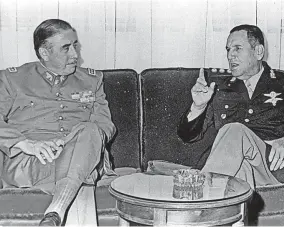  ?? ?? Dictator General Augusto Pinochet (left) with Juan Peron, the Argentinia­n president