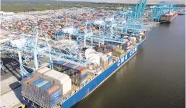  ?? ASSOCIATED PRESS FILE PHOTO ?? A container ship is unloaded at the Virginia Internatio­nal Gateway terminal in Norfolk in May 2019.