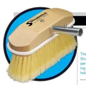  ??  ?? The medium-soft yellow Shurhold brush will handle 95 percent of the work when washing your boat. The feathered tips hold plenty of soapy water.