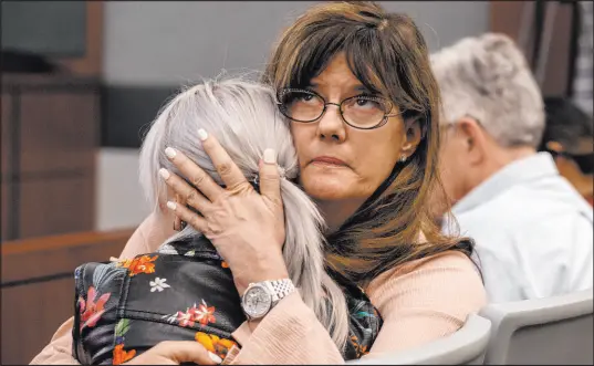  ?? Las Vegas Review-journal file ?? Amelia Claypool’s mother, Lee Ann Pretto, hugs her daughter Olivia Claypool after the sentencing of Noah Ray Hadley on Dec. 4, 2019. Hadley took a plea deal of involuntar­y manslaught­er for fatally shooting Amelia Claypool at a Henderson house party.