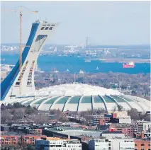  ?? RYAN REMIORZ/THE CANADIAN PRESS ?? The Quebec government has given the go-ahead to replacing the Olympic Stadium’s roof at an estimated cost of $200 million, which Jack Todd believes will be at least $250 million. So why not scrap the Big Owe and save money for a new stadium?