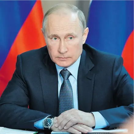  ?? ALEXEI NIKOLSKY / SPUTNIK / KREMLIN POOL / PHOTO VIA THE ASSOCIATED PRESS ?? It is taken for granted that Russian President Vladimir Putin was the ultimate authority behind the effort to disrupt the U. S. election and western democracy in general, Kelly McParland writes.