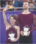  ??  ?? Meagan Duhamel et Eric Radford