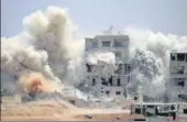  ?? AFP FILE ?? Smoke rises around buildings following an air strike on a rebelheld area in the southern Syrian city of Daraa.