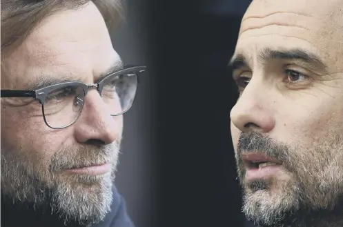  ??  ?? Liverpool manager Jurgen Klopp, left, and Manchester City counterpar­t Pep Guardiola will face off in next month’s quarter-finals.