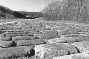  ?? ERIC SEALS/DETROIT FREE PRESS ?? The Belgian Block at the GM Milford Proving Ground in Milford, Mich., is a 2-mile replica of the real brick road in Belgium from Antwerp to Brussels, discovered during World War I by U.S. soldiers. It is used for suspension and durability testing.