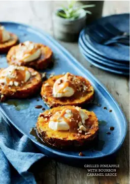  ??  ?? GRILLED PINEAPPLE WITH BOURBON CARAMEL SAUCE