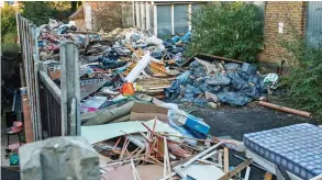  ??  ?? Filth: Piles of timber, mattresses and rubbish sacks at the old hospital Safety fears: Travellers used every corner of the site