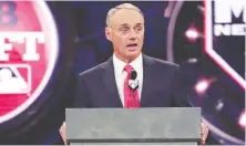  ?? THE ASSOCIATED PRESS/FILES ?? MLB commission­er Rob Manfred, seen in June 2019, says there is 100 per cent certainty that games will be played this season.