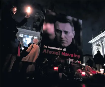  ?? Photo: Angelo CARCONI/EPA-EFE ?? People in Rome, Italy, attend a torchlight procession on 19 February in memory of Russian opposition leader Alexei Navalny, who died on 16 February in a Russian Arctic penal colony.