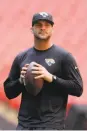  ?? Matt Dunham / Associated Press ?? The Raiders’ Derek Carr, left, and Jaguars’ Blake Bortles have benefited from Greg Olson’s tutelage.