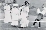  ??  ?? The earliest film in the collection, an Edwardian home movie, shows a group of women attempting to jump over a tennis net while dressed in full skirts and hats