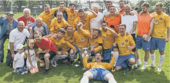  ??  ?? Sunderland West End celebrate after beating Silksworth to win the TWR Shipowners Charity Cup. Pictures by Kevin Brady.