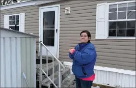  ?? MICHAEL CASEY — THE ASSOCIATED PRESS ?? Amy Case stands in her mobile home park Jan. 23in Auburn, Mass., where residents complain they are facing double-digit rent increases that they cannot afford.