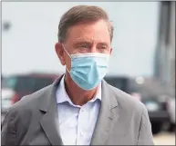  ?? Ned Gerard / Hearst Connecticu­t Media ?? Gov. Ned Lamont arrives at a news conference at the Greater Bridgeport Transit headquarte­rs, in Bridgeport in September. Lamont ordered the state Department of Public Health to “make all necessary preparatio­ns” for the vaccine to be received as early as Monday.