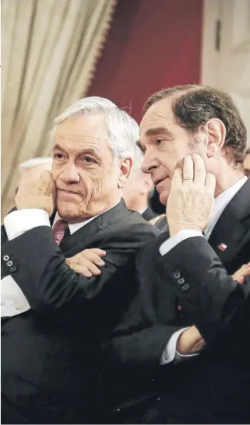  ??  ?? ► El Presidente Sebastián Piñera junto al ministro de Justicia, Hernán Larraín.