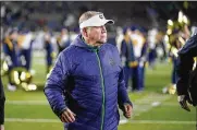  ?? DARRON CUMMINGS / AP ?? Brian Kelly worked his way up to the head coach of Notre Dame by following up his Division II national titles at Grand Valley State with winning stints at Central Michigan and Cincinnati.