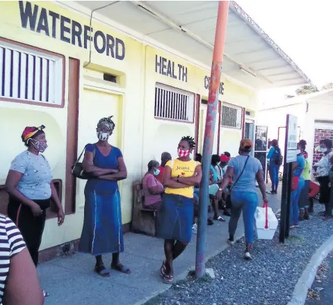  ?? PHOTO BY RUDDY MATHISON ?? Patients waiting outside the Waterford Health Centre. Residents contend that the facility needs to be expanded and improved to serve an increasing number of patients.