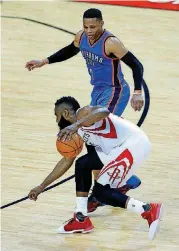  ?? [PHOTO BY SARAH PHIPPS, THE OKLAHOMAN] ?? The Thunder’s Russell Westbrook defends the Rockets’ James Harden during the teams’ first-round playoff series last month. The two on Friday were named finalists for the NBA Most Valuable Player Award.