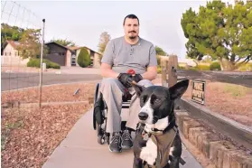  ?? COURTESY OF DERECK SCOTT ?? Dereck Scott says the discrimina­tion, harassment and retaliatio­n he suffered at CNM began after his service animal, Marybell, barked. She is trained to bark when she senses he may be in trouble. Scott has multiple sclerosis.